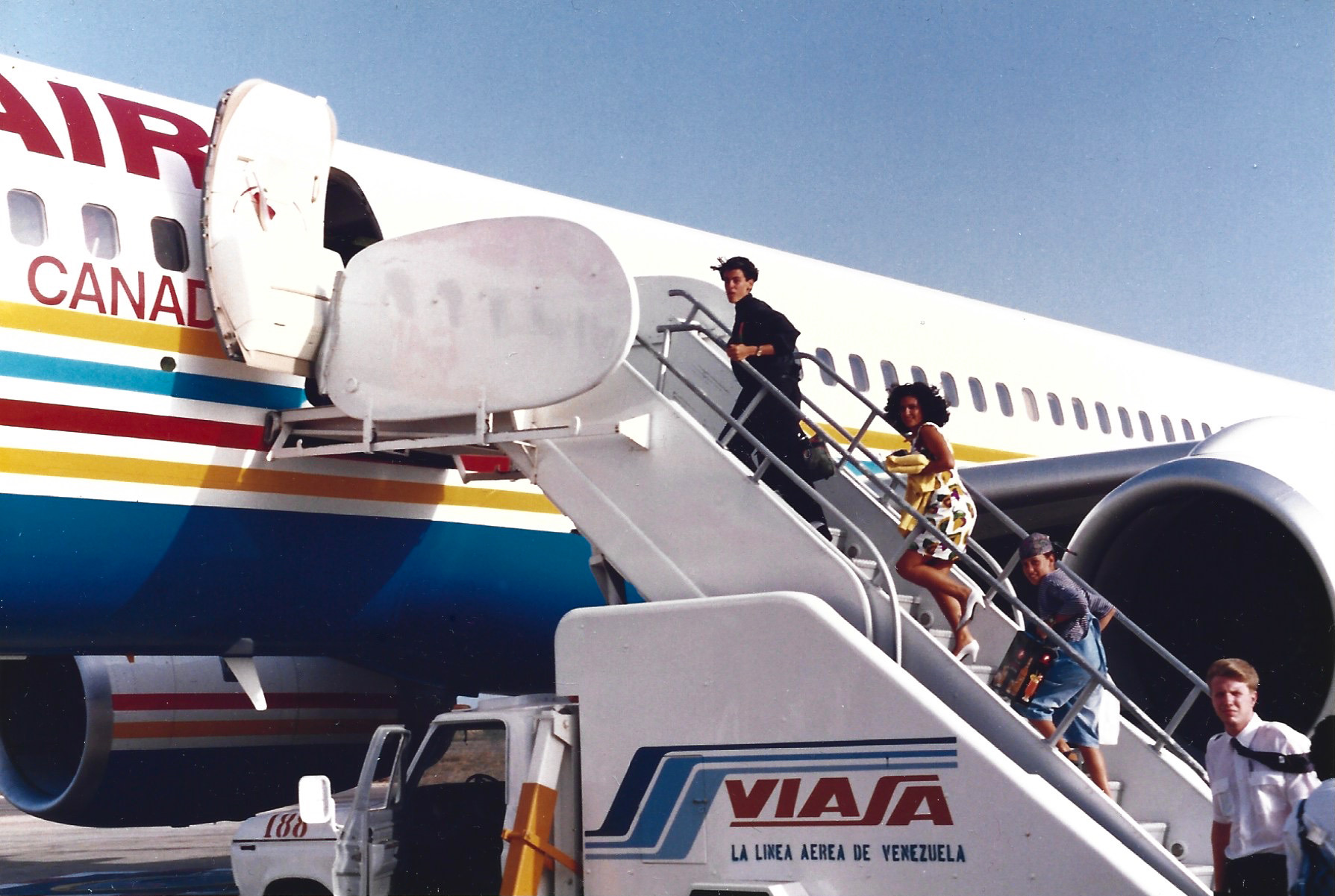 Mickael, Maryse and Nicolas Casol in Venezuela in 1992, embarking an Air Canada plane, to return home to Montreal, after their vacations in the Caribbean on la Isla de Margarita island.